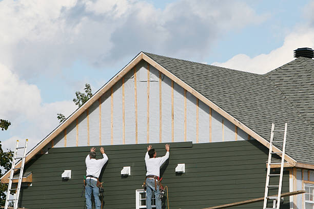 Professional Emergency Siding Repair technician working in Huntington, TX